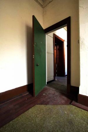 Asylum Room with Green Door