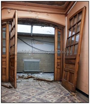 Some one has butchered the frame holding these magnificent doors, expect them to be stolen very soon..March 2010